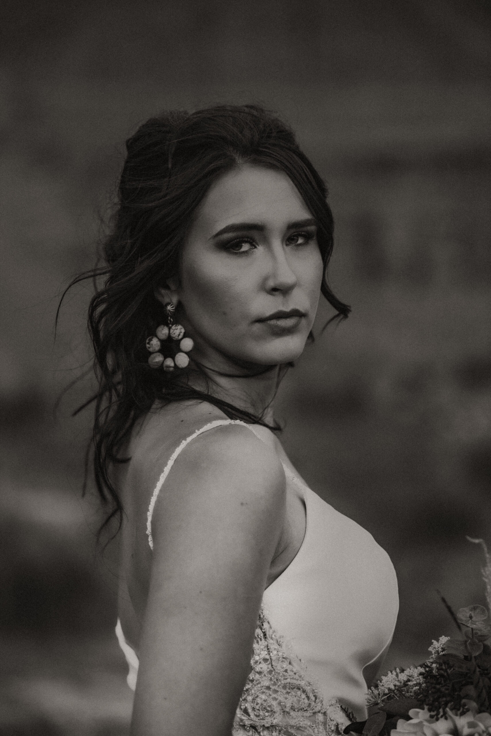 western bride posing for bridal photos while in desert in Texas, bridal session portrait photos, Texas wedding photographer